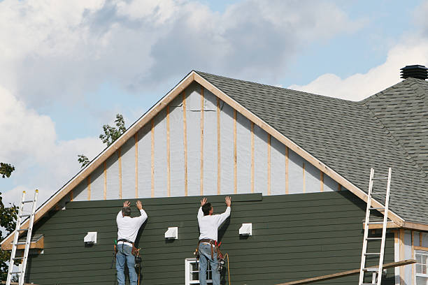 Professional Emergency Siding Repair technician working in Cortland, OH